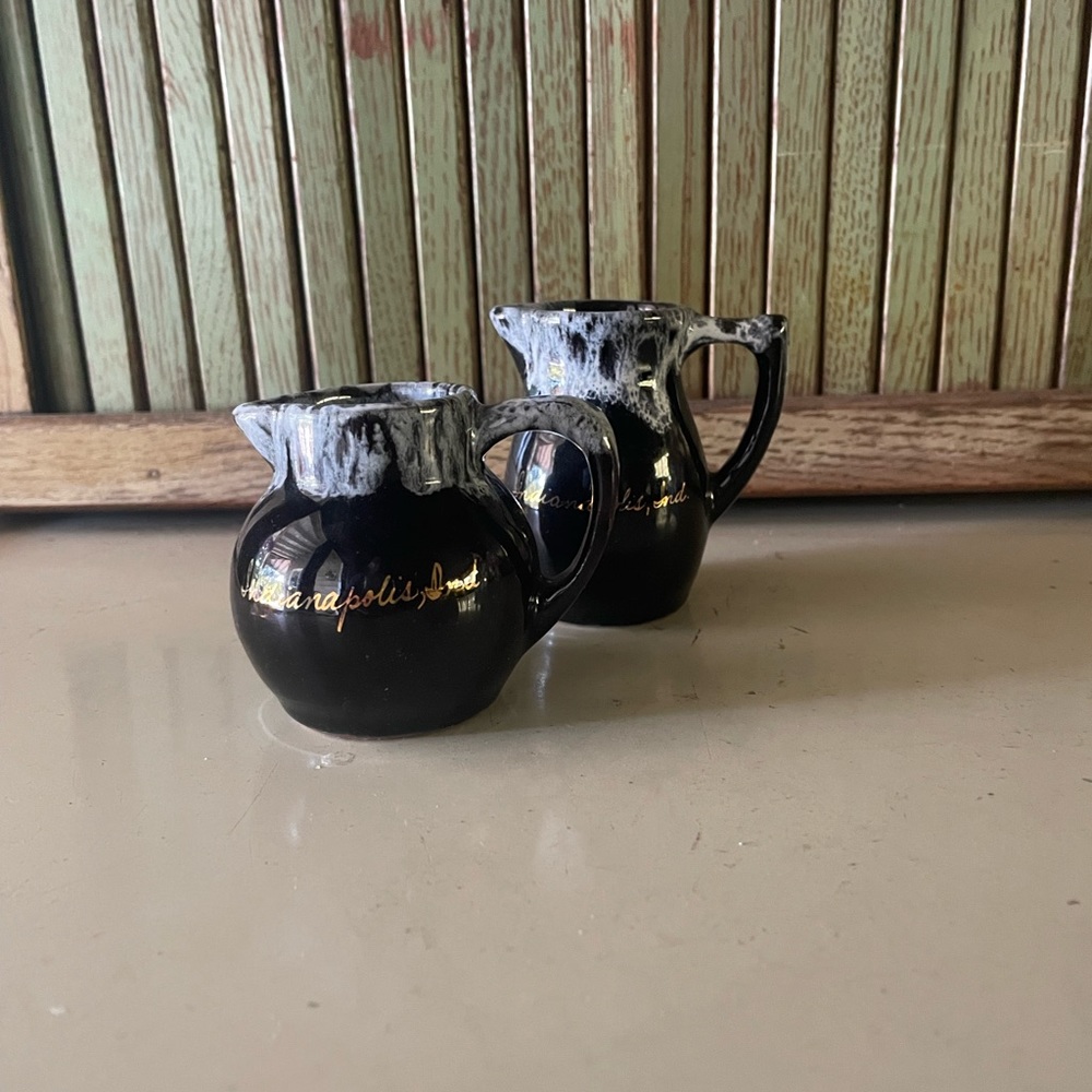 Pair if red ware pitchers. Vintage souvenir